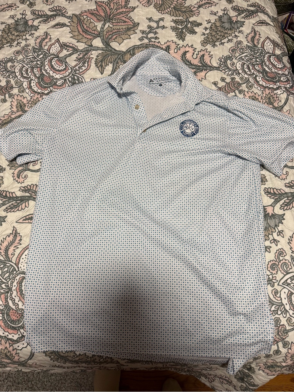 Light Blue Micro-Print Polo Shirt with Chest Emblem
